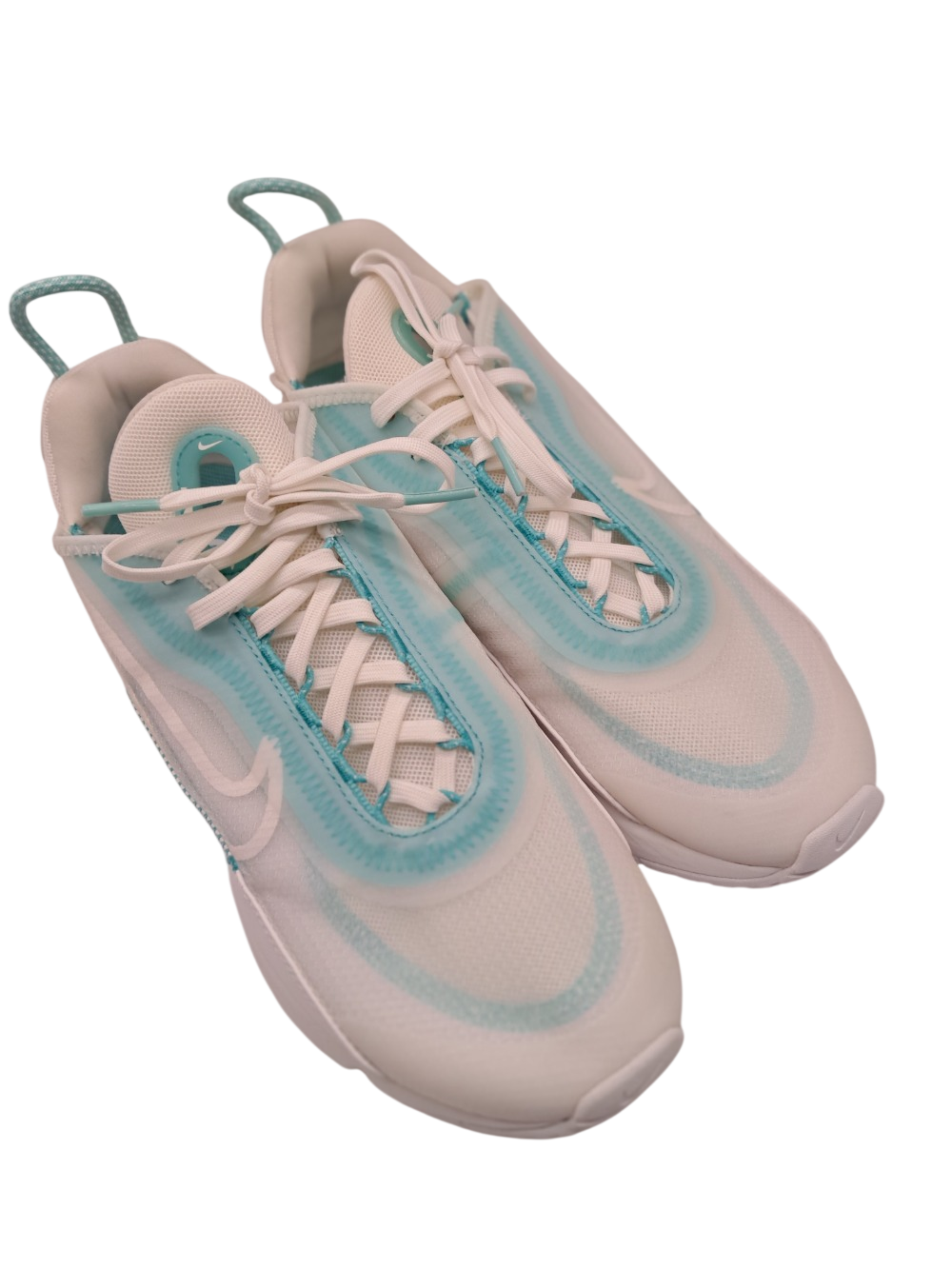 Chaussures Nike blanches et turquoises